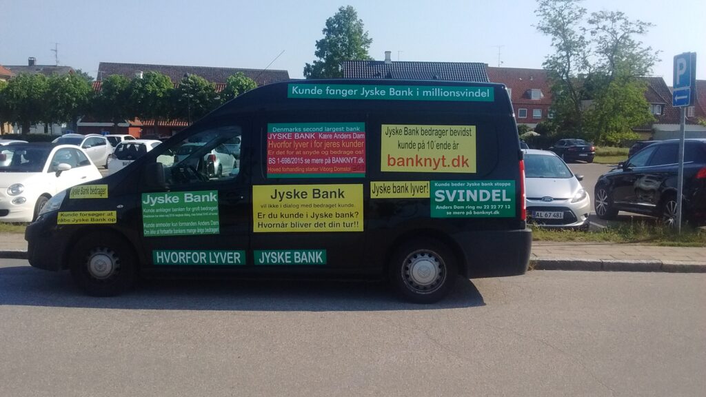 Jyske Banks Fundament 
Vedtægter 
§ 1 Stk. 1: Bankens navn er Jyske Bank A/S.

Stk. 4: Bankens formål er som bank og som moderselskab at drive bankvirksomhed efter lovgivningen

Stk. 5: Banken drives i overensstemmelse med redelig forretningsskik, god bankpraksis og bankens værdier og holdninger

:-)
:-)

Lidt søge ord.

#Justitsministeriet 
#Finansministeriet
#Statsministeriet

JYSKE BANK BLEV OPDAGET / TAGET I AT LAVE

#MANDATSVIG
#BEDRAGERI
#DOKUMENTFALSK 
#UDNYTTELSE 
#SVIG
#FALSK

/

#Bank #AnderChristianDam 
#Financial #News #Press #Share #Pol #Recommendation #Sale #Firesale #AndersDam #JyskeBank #ATP #PFA #MortenUlrikGade #PhilipBaruch #LES #Boxen Jyske Bank Boxen #KristianAmbjørnBuus-Nielsen #LundElmerSandager #Nykredit #MetteEgholmNielsen #Loan #Fraud #CasperDamOlsen #NicolaiHansen #JeanettKofoed-Hansen #AnetteKirkeby #SørenWoergaaed #BirgitBushThuesen

#Gangcrimes #Crimes

#Koncernledelse #jyskebank 
#Koncernbestyrelsen #SvenBuhrkall #KurtBligaardPedersen #RinaAsmussen #PhilipBaruch #JensABorup #KeldNorup #ChristinaLykkeMunk #HaggaiKunisch #MarianneLillevang #Koncerndirektionen #AndersDam #LeifFLarsen #NielsErikJakobsen #PerSkovhus #PeterSchleidt