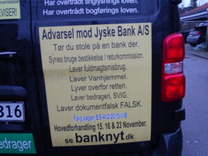 When the Danish authorities, including the Prime Minister’s Office, the Government, the Ministry of Finance, the Danish Financial Supervisory Authority, the Ministry of Justice, Denmark’s Nationalbank, the National Courts Administration, the National Police, the Public Prosecutor’s Office, the Public Prosecutor, the politicians all know and are aware that Jyske Bank is a criminal organization. That they are all fully aware of JYSKE BANK’s use of criminal crime. And they have all been presented with documentation that Denmark’s second largest bank, JYSKE BANK, is behind extensive and outspoken crime. Crime which has been committed by several employees and aides in Jyske Bank. Therefore, it is organized crime, committed in association with the bank’s employees, which is why Jyske Bank is a criminal organization. The crime that Jyske Bank is behind has been documented to the authorities. And the Danish authorities have submitted full documentation, that Jyske Bank has made use of document false, power of attorney abuse, abuse of Jyske Bank’s access to the land registry, power abuse, exploitation, court abuse, bribery, fraud. But when the Danish authorities refuse to interfere in the crime of Danish banks, it is because of camaraderie. Comradeship is the same as corruption. When Denmark’s most powerful people, each cover other, to prevent the Danish police from investigating the organized crime, committed by the Danish banks against the bank’s customers, it is also a problem for the rule of law. But when the Danish authorities refuse to interfere in the crime of Danish banks, it is because of camaraderie. Therefore, there is no help to get from the Danish state and the Danish authorities, when you are exposed to crime by a danish bank, and this has been carried out by Denmark’s largest organizations, which also includes Danish banks. The Jyske Bank Group is among the most powerful organizations in Denmark, and commits fraud and forgery and also uses bribes, to escape the bank’s fraud, and without risk of interference, neither from the Danish Financial Supervisory Authority nor the police who are not allowed to investigate and prosecute the largest Danish criminal companies. It is political to hold hands over Danish banks’ use of crime. Note that not once have some who have received information about Jyske Bank’s use of forgery and fraud dared to answer me. Not a single one has dared to comment on my campaigns and videos, as well as advertisements, such as my Jyske Bank cars, which have a car parked in front of Jyske Bank in Copenhagen, without anyone daring to say anything. If some Danish authority or in as mentioned on the page BANKNYT.dk dare to say against me, or take a confrontation with me, maybe even dare to accuse me of lying. Then you just come and accuse me of not writing the truth about the Jyske Bank A/S Best regards Carsten Storbjerg Skaarup Soevej 5. 3100 Hornbaek. +4522227713