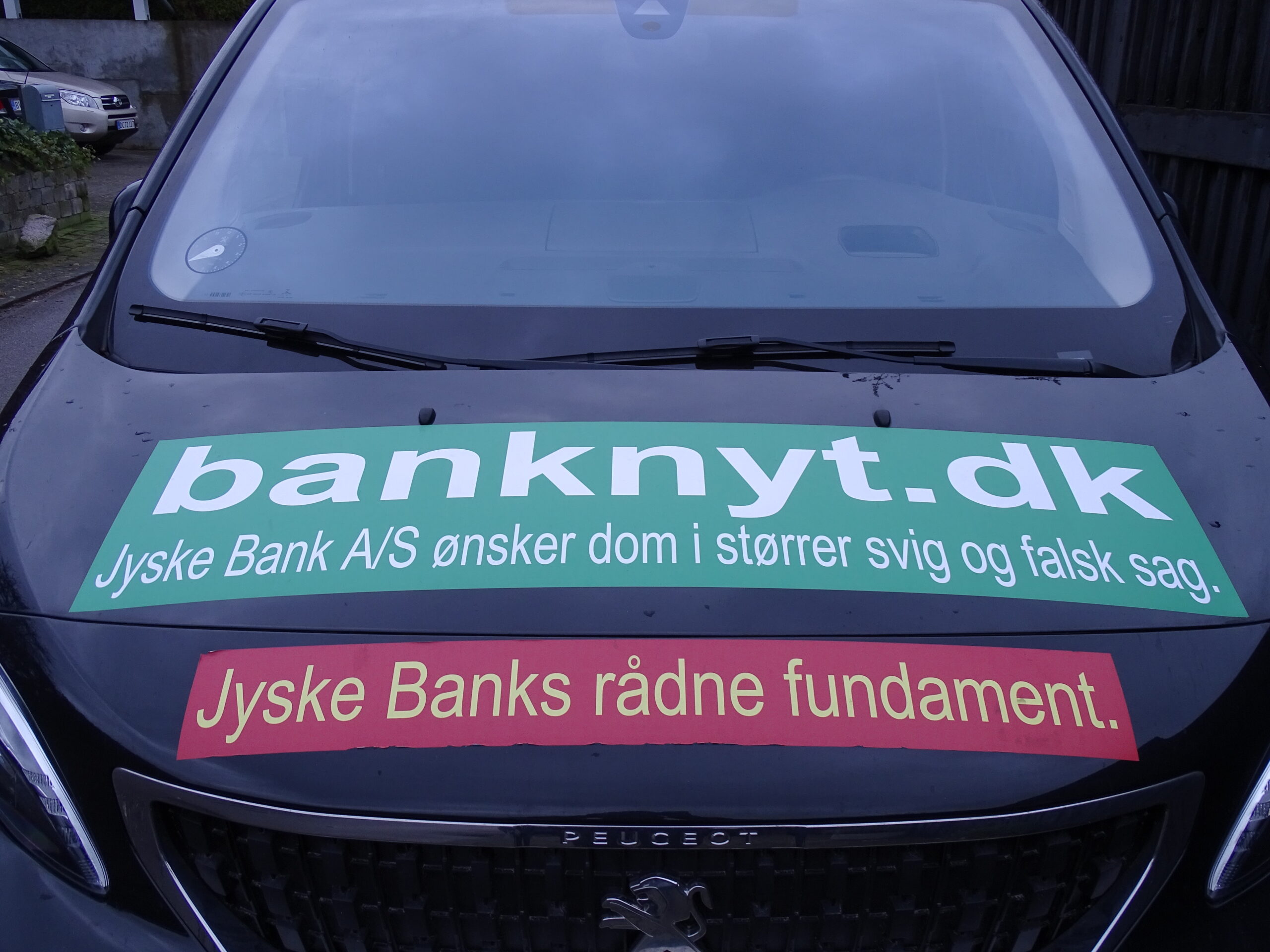 When the Danish authorities, including the Prime Minister’s Office, the Government, the Ministry of Finance, the Danish Financial Supervisory Authority, the Ministry of Justice, Denmark’s Nationalbank, the National Courts Administration, the National Police, the Public Prosecutor’s Office, the Public Prosecutor, the politicians all know and are aware that Jyske Bank is a criminal organization. That they are all fully aware of JYSKE BANK’s use of criminal crime. And they have all been presented with documentation that Denmark’s second largest bank, JYSKE BANK, is behind extensive and outspoken crime. Crime which has been committed by several employees and aides in Jyske Bank. Therefore, it is organized crime, committed in association with the bank’s employees, which is why Jyske Bank is a criminal organization. The crime that Jyske Bank is behind has been documented to the authorities. And the Danish authorities have submitted full documentation, that Jyske Bank has made use of document false, power of attorney abuse, abuse of Jyske Bank’s access to the land registry, power abuse, exploitation, court abuse, bribery, fraud. But when the Danish authorities refuse to interfere in the crime of Danish banks, it is because of camaraderie. Comradeship is the same as corruption. When Denmark’s most powerful people, each cover other, to prevent the Danish police from investigating the organized crime, committed by the Danish banks against the bank’s customers, it is also a problem for the rule of law. But when the Danish authorities refuse to interfere in the crime of Danish banks, it is because of camaraderie. Therefore, there is no help to get from the Danish state and the Danish authorities, when you are exposed to crime by a danish bank, and this has been carried out by Denmark’s largest organizations, which also includes Danish banks. The Jyske Bank Group is among the most powerful organizations in Denmark, and commits fraud and forgery and also uses bribes, to escape the bank’s fraud, and without risk of interference, neither from the Danish Financial Supervisory Authority nor the police who are not allowed to investigate and prosecute the largest Danish criminal companies. It is political to hold hands over Danish banks’ use of crime. Note that not once have some who have received information about Jyske Bank’s use of forgery and fraud dared to answer me. Not a single one has dared to comment on my campaigns and videos, as well as advertisements, such as my Jyske Bank cars, which have a car parked in front of Jyske Bank in Copenhagen, without anyone daring to say anything. If some Danish authority or in as mentioned on the page BANKNYT.dk dare to say against me, or take a confrontation with me, maybe even dare to accuse me of lying. Then you just come and accuse me of not writing the truth about the Jyske Bank A/S Best regards Carsten Storbjerg Skaarup Soevej 5. 3100 Hornbaek. +4522227713